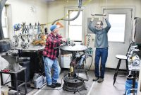 Sculptor Gary Hovey, right, talks with his friend of 35 years Jim Perrine, both of New Knoxville, in Hovey's workshop. Perrine sometimes helps Hovey work on his sculptures.